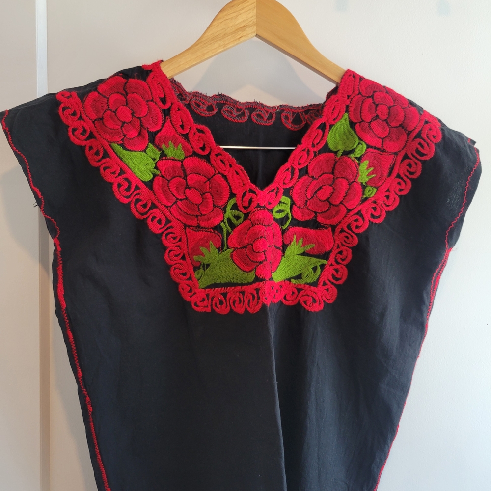 Embroidered Black Top with Red Floral Design
